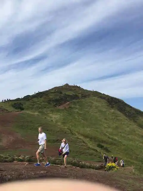 People walking up to Arthur's Seat