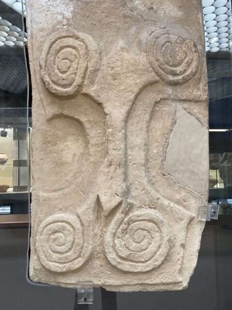 Stone door with relief design