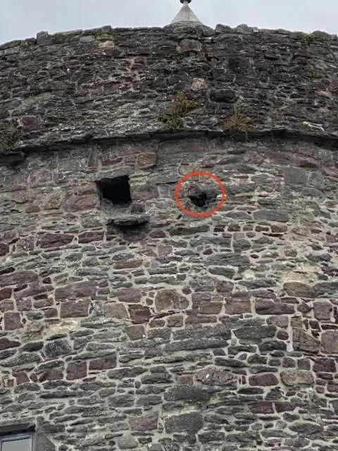 Cannonball in the wall of Reginald's Tower
