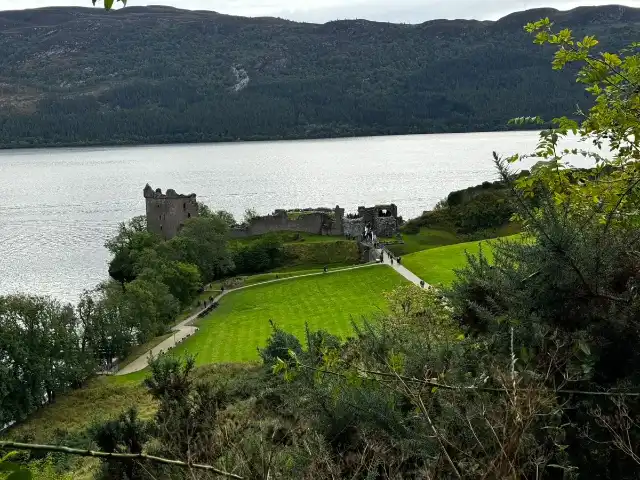 Uquhart Castle in the mid-ground with Loch Ness behind it