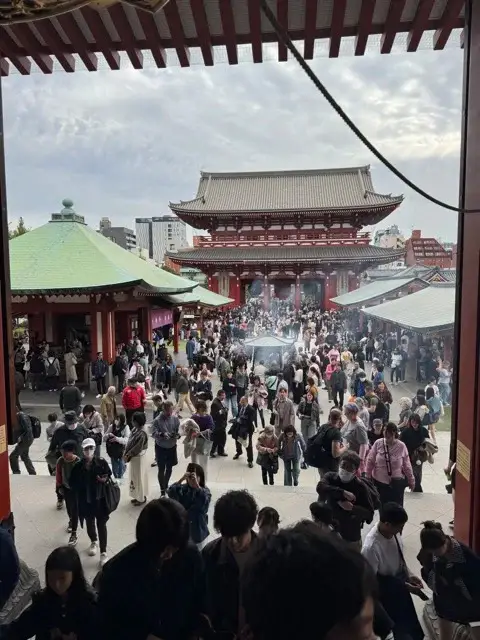 A veiw of the gate from atop the steps of Senso-ji Temple