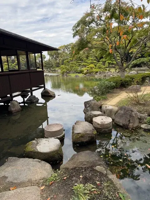 Wood structure beside the pond Keitakuen Garden