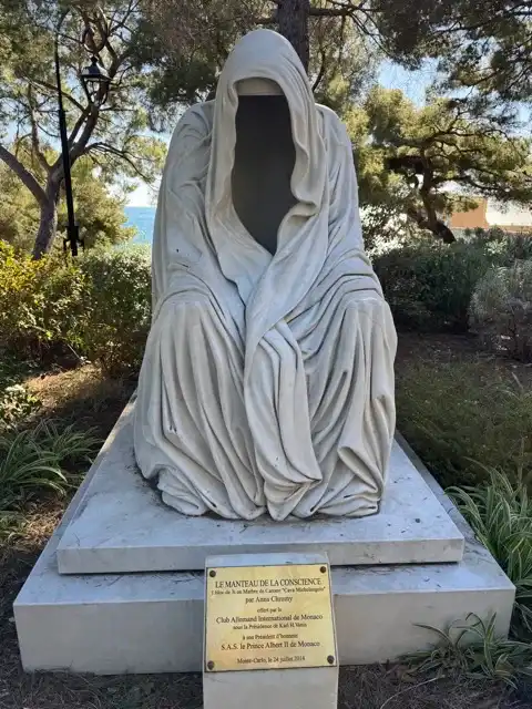 An empty robe statue I saw on my way to my first destination of the afternoon. Posted here so you'd have something interesting to look at while I kvetched