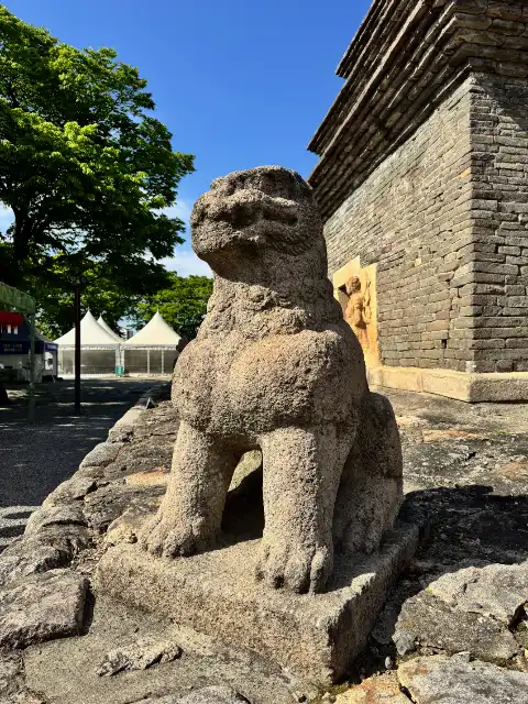 One of the stone lions guarding the pagoda