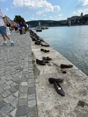 Shoes on the Danube as seen from one end of the row of shoes
