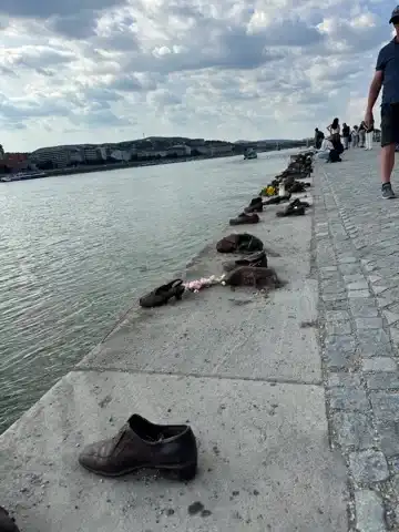 Shoes on the Danube as seen from the other end of the row of shoes