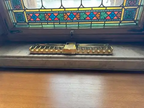 One of the cigar holders on the window sills