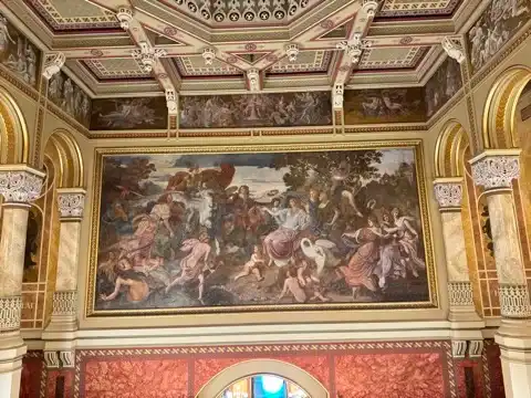 A painting at the top of the grand staircase of Pesti Vigadó