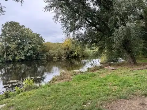 River Aire as it runs by the grounds of Kirkstall Abbey