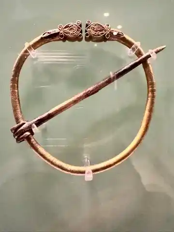 A bracelet thrown into the Sacred Spring
