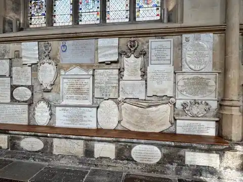 Memorial stones on the wall of the Abbey