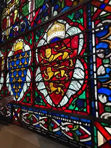Getting up close and personal with a stained glass window while on the triforium